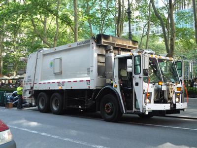 A municipal refuse lorry. The dispute concerns who collects the city's waste.