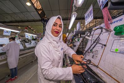 An electronics assembly line. Third-quarter revenue was attributed to AI server demand.