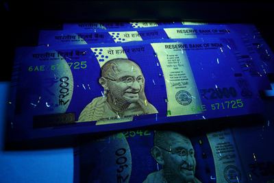 A 2,000 rupee note. The advance estimate is a projection of output measured in money at constant prices.