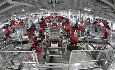 A vehicle assembly line. Both firms sell industrial control and software.